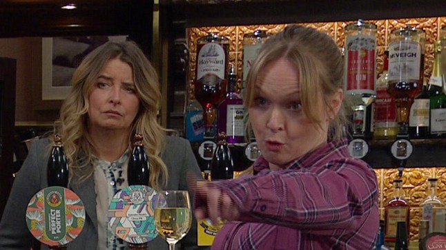 Vanessa confronts Tracy in front of Pollard and Charity in the pub in Emmerdale