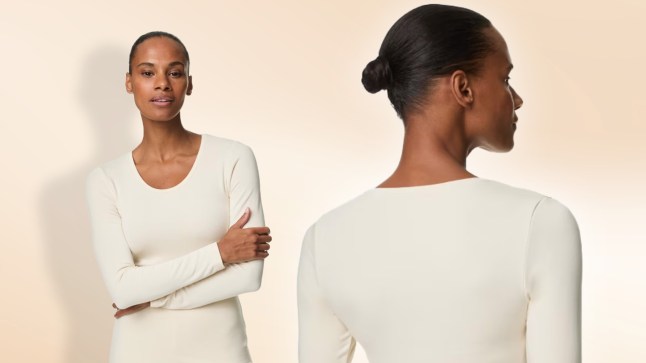 Model wears white/cream M&S Heatgen Medium Thermal Scoop Neck Top