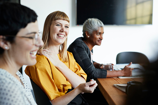 Entrepreneur with coworker in office meeting