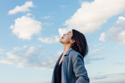 Young Lady Embracing Hope And Freedom