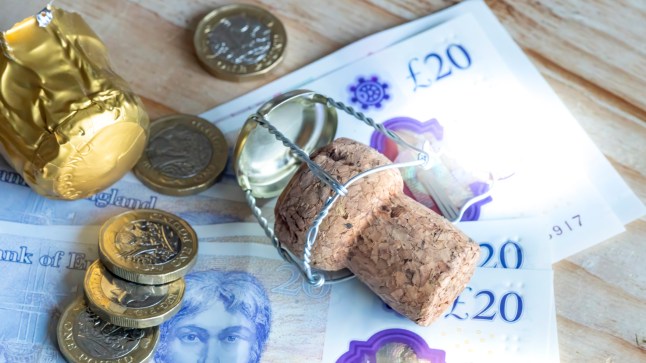 New £20 notes and champagne cork.