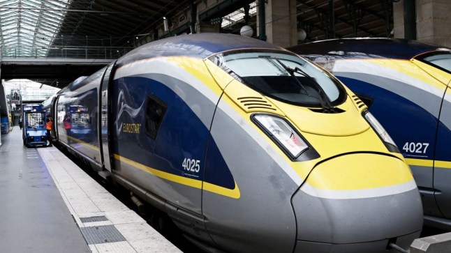 Two Eurostar trains pulled into a French rial station.