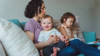 Mom and two kids spending time together at home
