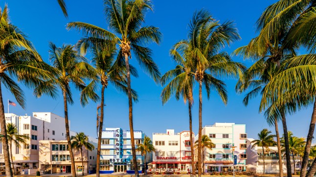 Multi-coloured vibrant art deco hotels along the Ocean Drive on a sunny day, in Miami Beach, Florida.