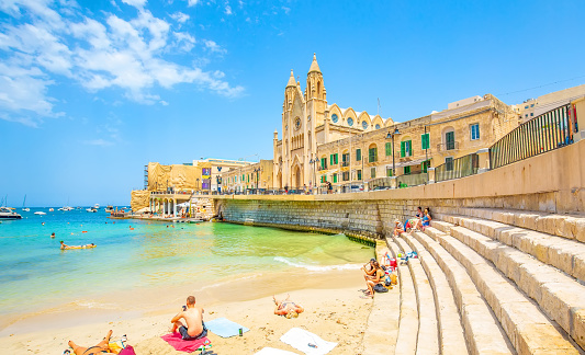 Balluta Bay beach in St Julian's town, Malta