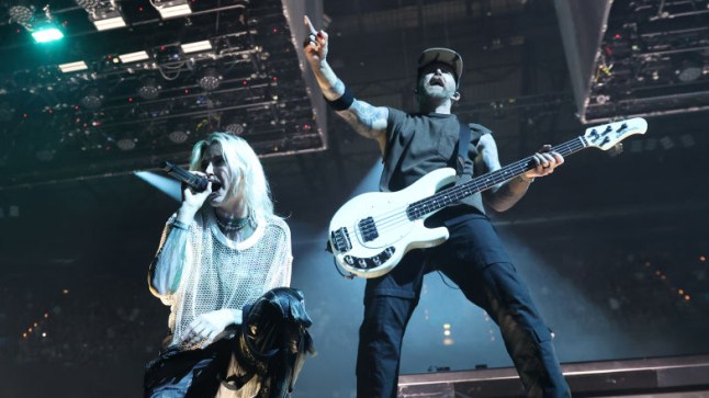 Linkin Park performing on stage with Emily Armstrong (L)