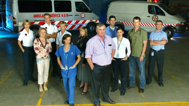 Doctors and nurses standing outside a hospital next to ambulances in Australian media drama All Saints