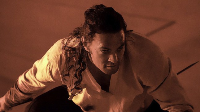 This image released by Warner Bros. Pictures shows Jason Momoa in a scene from "Dune." (Warner Bros. Pictures via AP)