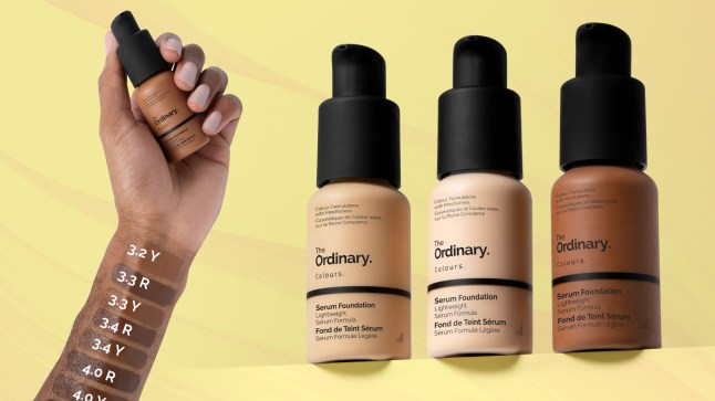 An arm with shade swatches of The Ordinary Serum Foundation, next to three bottles of different shades.
