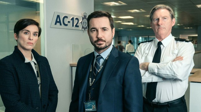 Martin Compston, Vicky McClure and Adrian Dunbar in Line of Duty, all in smart office attire and looking stern.
