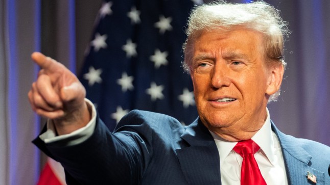 TOPSHOT - US President-elect Donald Trump gestures while speaking during a meeting with House Republicans at the Hyatt Regency hotel in Washington, DC on November 13, 2024. (Photo by Allison ROBBERT / POOL / AFP) (Photo by ALLISON ROBBERT/POOL/AFP via Getty Images)