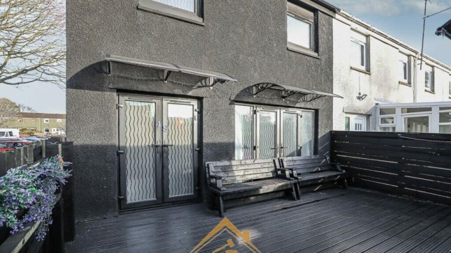The property in Broxburn, West Lothian.Photo released January 15 2025. The UK's 'darkest ever' house is up for auction - with entirely black exterior, ceilings and KITCHEN.The unique property in Broxburn, West Lothian, has an eye-catching theme - black.It has fully black exterior walls as well as a black front door, black fencing and black decking with a black shed in the back garden.The stairs, floors, as well as most of the ceilings and walls are black too.Even the kitchen fridge and bathroom are the same shade.The only variation is dark purple accents - such as curtains, feature walls and sofa cushions, making it a strong contender for the title of the 'UK's darkest home'.