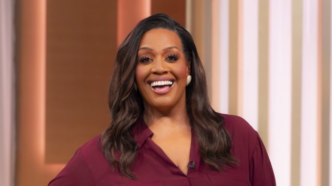 Alison Hammond in a red-purple top