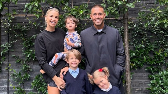 Spencer Matthews, Vogue Williams and kids all stood in front of greenery