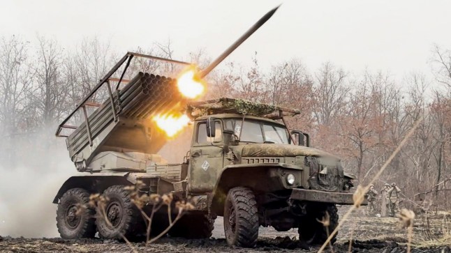 In this photo distributed by Russian Defense Ministry Press Service on Thursday, March 20, 2025, a Russian "Grad" self-propelled multiple rocket launcher fires towards Ukrainian positions in Ukraine. (Russian Defense Ministry Press Service via AP)