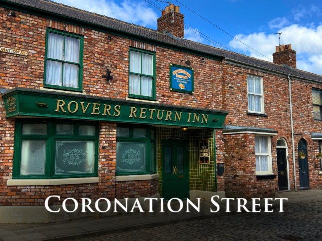 Coronation Street logo in front of the Rovers Return pub.