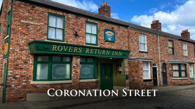 Coronation Street logo in front of the Rovers Return pub.
