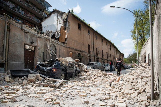 Emergency services at the scene after an explosion at a building thought to be a gas leak, in Via Pio Fo?? and Via Vitellia, in Rome, Sunday, March 23, 2025 (Valentina Stefanelli/LaPresse via AP)