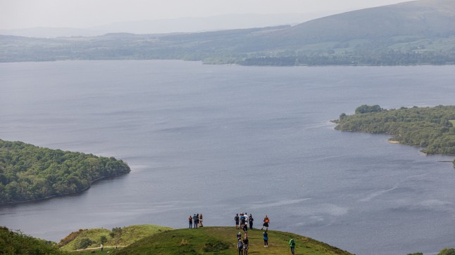 Mandatory Credit: Photo by Kostas Pikoulas/ZUMA Press Wire/REX/Shutterstock (15190095b) People are watching the view of Loch Lomond from Conic Hill, Glasgow, Great Britain, on May. 17, 2024. Scotland travel, Glasgow, Limassol, Great Britain - 17 May 2024