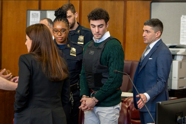 FILE - Luigi Mangione, accused of fatally shooting the UnitedHealthcare CEO Brian Thompson in New York City and leading authorities on a five-day search is scheduled, appears in court for a hearing, Friday, Feb. 21, 2025, in New York. (Steven Hirsch/New York Post via AP, Pool, File)