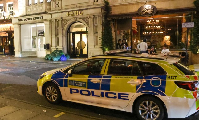 A terrifying incident unfolded at the Tabu nightclub in Mayfair, London, in the early hours of Sunday morning when a group of men armed with machetes attempted to force their way into the popular venue. Incident Details The drama erupted on Dover Street when the group, who had been refused entry to the renowned Hawaiian-themed nightclub earlier in the evening, returned armed with large blades. Witnesses described the chaotic scenes as the men tried to charge the club's entrance, brandishing machetes in an attempt to gain access. Men Armed With Machetes Attempt To Storm Tabu Club In Mayfair Swift Police Response Officers from the Metropolitan Police rushed to the scene after receiving reports of the disturbance. Police sources have confirmed that several arrests have been made and a number of machetes have been recovered. Men Armed With Machetes Attempt To Storm Tabu Club In Mayfair A nearby venue manager, who wished to remain anonymous, described the terrifying moment the armed men attempted to storm the club: "It was pure chaos. The men tried to charge the door with large blades. How anyone wasn???t hurt was just pure luck. Our customers come out for a good evening, and they don???t expect to see something like this." Men Armed With Machetes Attempt To Storm Tabu Club In Mayfair He also praised the swift response from the police: "The officers dealt with it very quickly, and we saw a number of people being arrested. It???s not good for business to have this kind of trouble, but thankfully the situation was brought under control." Club Profile Mahiki, located on Dover Street in Mayfair, is a well-known Hawaiian-themed nightclub and bar famous for its tropical cocktails and celebrity clientele. Notable guests over the years have included Paris Hilton, Kelly Rowland, Lady Gaga, and Rihanna. The club's exclusive atmosphere makes it a popular destination for high-profile individuals. Men Armed With Machetes Attempt To Storm Tabu Club In Mayfair