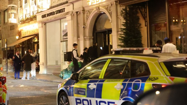 A terrifying incident unfolded at the Tabu nightclub in Mayfair, London, in the early hours of Sunday morning when a group of men armed with machetes attempted to force their way into the popular venue. Incident Details The drama erupted on Dover Street when the group, who had been refused entry to the renowned Hawaiian-themed nightclub earlier in the evening, returned armed with large blades. Witnesses described the chaotic scenes as the men tried to charge the club's entrance, brandishing machetes in an attempt to gain access. Men Armed With Machetes Attempt To Storm Tabu Club In Mayfair Swift Police Response Officers from the Metropolitan Police rushed to the scene after receiving reports of the disturbance. Police sources have confirmed that several arrests have been made and a number of machetes have been recovered. Men Armed With Machetes Attempt To Storm Tabu Club In Mayfair A nearby venue manager, who wished to remain anonymous, described the terrifying moment the armed men attempted to storm the club: "It was pure chaos. The men tried to charge the door with large blades. How anyone wasn???t hurt was just pure luck. Our customers come out for a good evening, and they don???t expect to see something like this." Men Armed With Machetes Attempt To Storm Tabu Club In Mayfair He also praised the swift response from the police: "The officers dealt with it very quickly, and we saw a number of people being arrested. It???s not good for business to have this kind of trouble, but thankfully the situation was brought under control." Club Profile Mahiki, located on Dover Street in Mayfair, is a well-known Hawaiian-themed nightclub and bar famous for its tropical cocktails and celebrity clientele. Notable guests over the years have included Paris Hilton, Kelly Rowland, Lady Gaga, and Rihanna. The club's exclusive atmosphere makes it a popular destination for high-profile individuals. Men Armed With Machetes Attempt To Storm Tabu Club In Mayfair