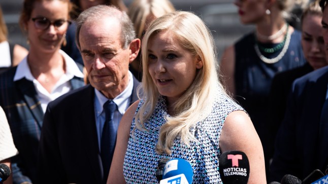 Virginia??Giuffre, an alleged victim of Jeffrey Epstein, center, speaks with members of the media outside of federal court in New York, U.S., on Tuesday, Aug. 27, 2019. Epstein, a convicted pedophile, killed himself in prison earlier this month while awaiting trial on charges of conspiracy and trafficking minors for sex. Photographer: Mark Kauzlarich/Bloomberg via Getty Images