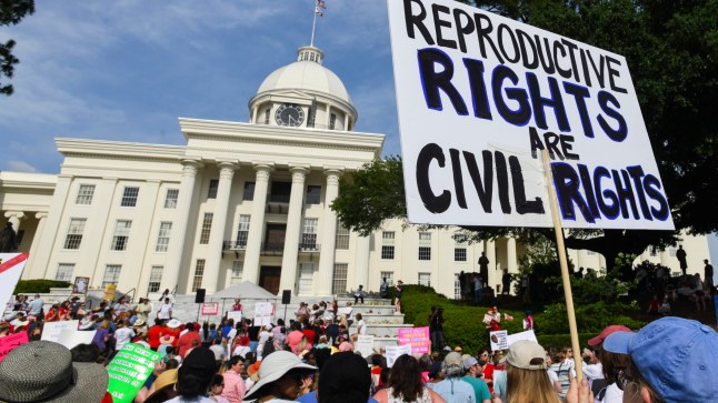 MONTGOMERY, AL - MAY 19: Protestors participate in a rally against one of the nation's most restrictive bans on abortions on May 19, 2019 in Montgomery, Alabama. Demonstrators gathered to protest HB 314, a bill passed by the Alabama Legislature last week making almost all abortion procedures illegal. (Photo by Julie Bennett/Getty Images)