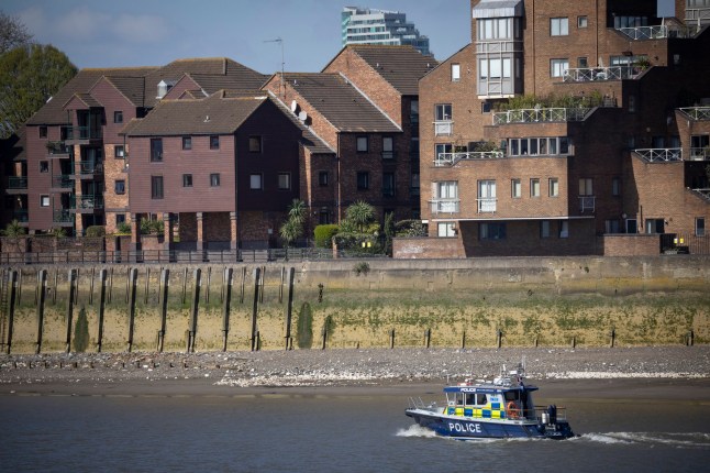 ?George Cracknell Wright 01/04/2025 London, United Kingdom Search Continues for 11 year old girl missing in the Thames Police boat Nina Mackay 3 searches the Thames from North Woolwich towards Greenwich in east London at low tide as the search for an 11 year old girl who fell into the river yesterday afternoon continues . Police were called at around 13:15hrs on Monday, 31 March to reports of an 11-year-old girl who had entered the River Thames near to Barge House Causeway, E16. Her next of kin have been made aware and are being supported by officers. Photo Credit: George Cracknell Wright