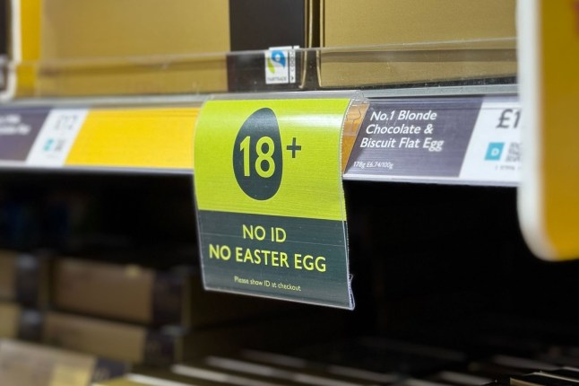 A sign reading 'no ID, no Easter Egg' in Waitrose supermarket